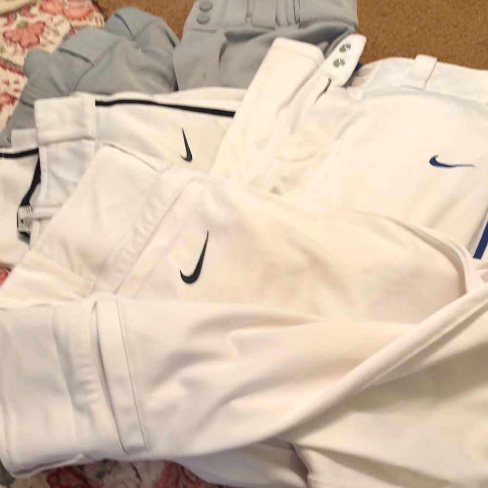 Kids size large XL and mens small Nike and under armor baseball pants